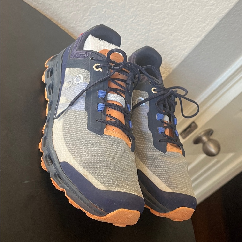 On Running Gray and Orange Athletic Shoes